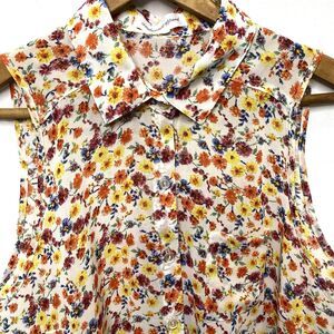 AMBIANCE APPAREL Blouse Sleeveless Sheer Tie Hi-Low Ditsy Floral Womens S White